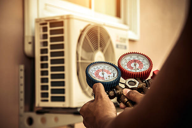Professional Hvac technician working in East Meadow, NY